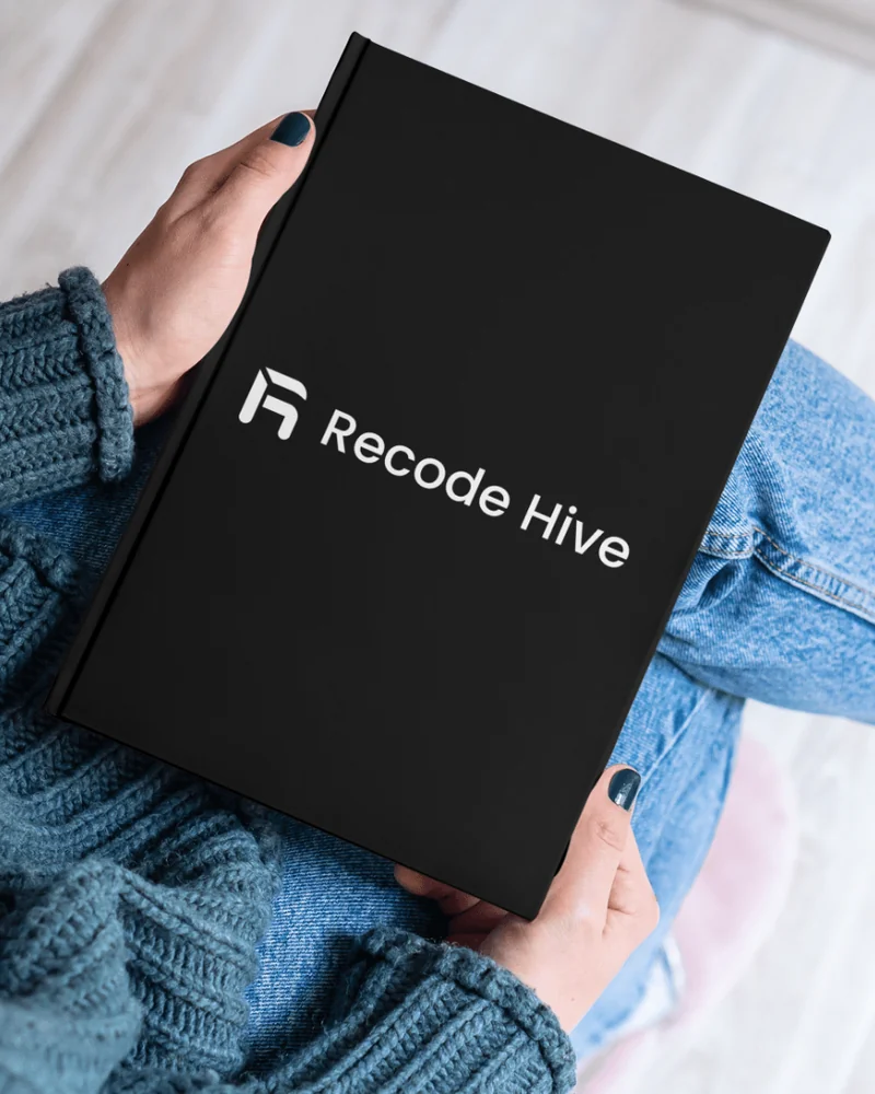 Black hardcover notebook with the recode hive wordmark on the cover